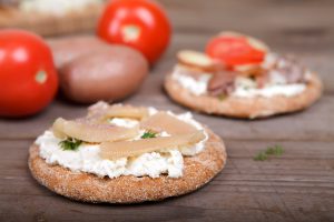 Two toasts with herring caviar
